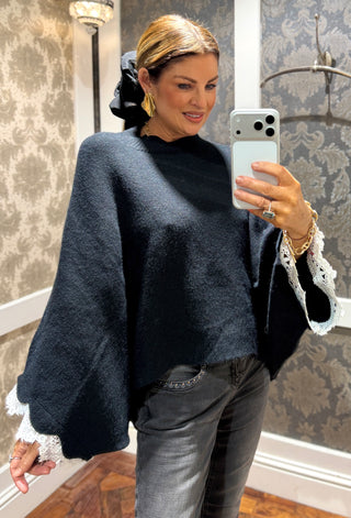 Judy- Black Poncho- White Trimming