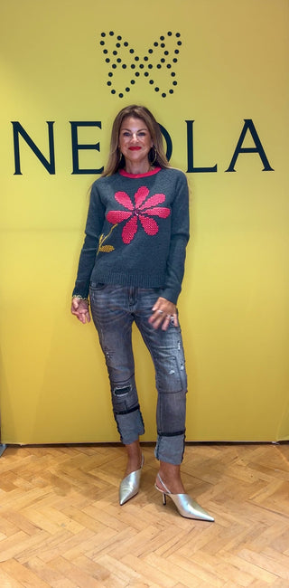 Elevate your wardrobe with the Adelita Grey Knit Sweater, featuring a charming pink collar that adds a fresh pop of color. Its delicate knitted floral design creates a unique, feminine touch, perfect for standing out with subtle elegance. Cozy and stylish, this sweater is ideal for layering and brings a sophisticated flair to any outfit.